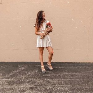 blush pink belted mini dress with stripes